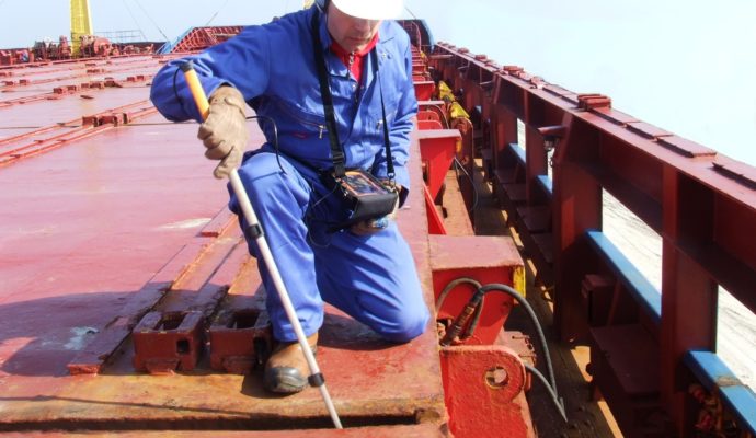 Cygnus Hatch Sure inspecting cargo hold hatch covers