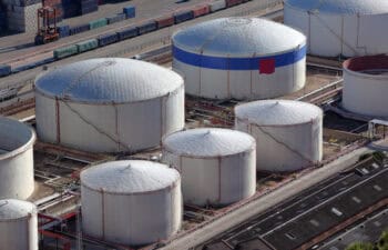 Aerial view of large oil tanks